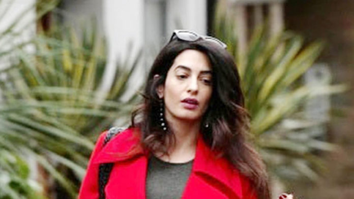 Pregnant Amal Clooney Dazzled In Her Red Coat