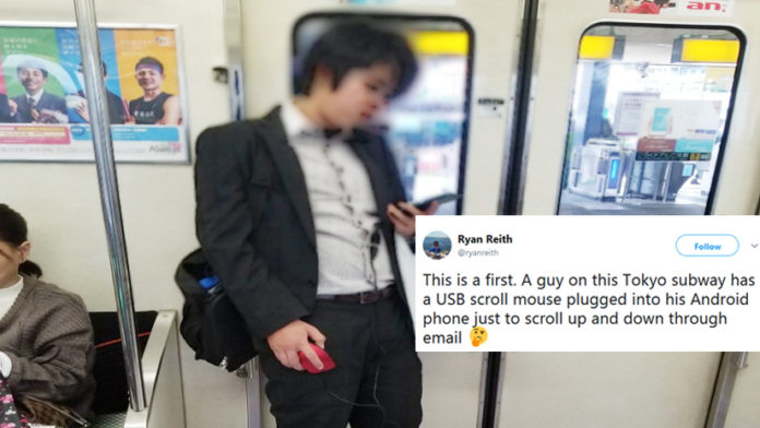 This Man Has An Innovative Way Of Scrolling Messages On His Phone And Twitter Is Going WOW!