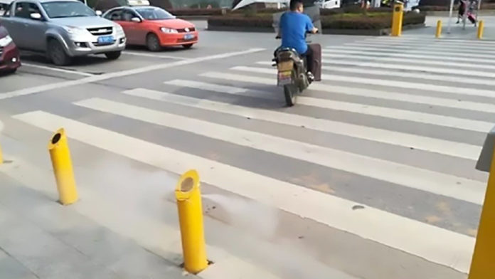 Water Pistols In China For People Who Cross Road Illegally